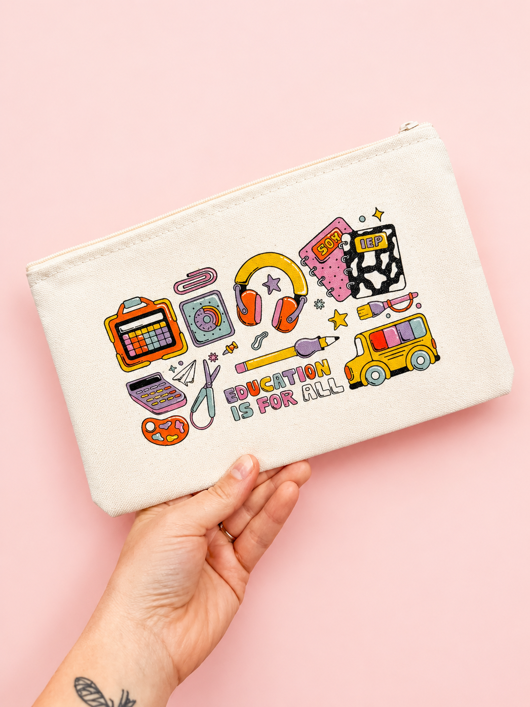 Pouch with educational-themed design and 'Education is for All' text on a pink background