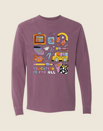 Purple long-sleeve shirt with educational-themed graphics on a beige background
