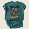Teal t-shirt with colorful floral design and text 'Find Joy in Connection' on a beige background