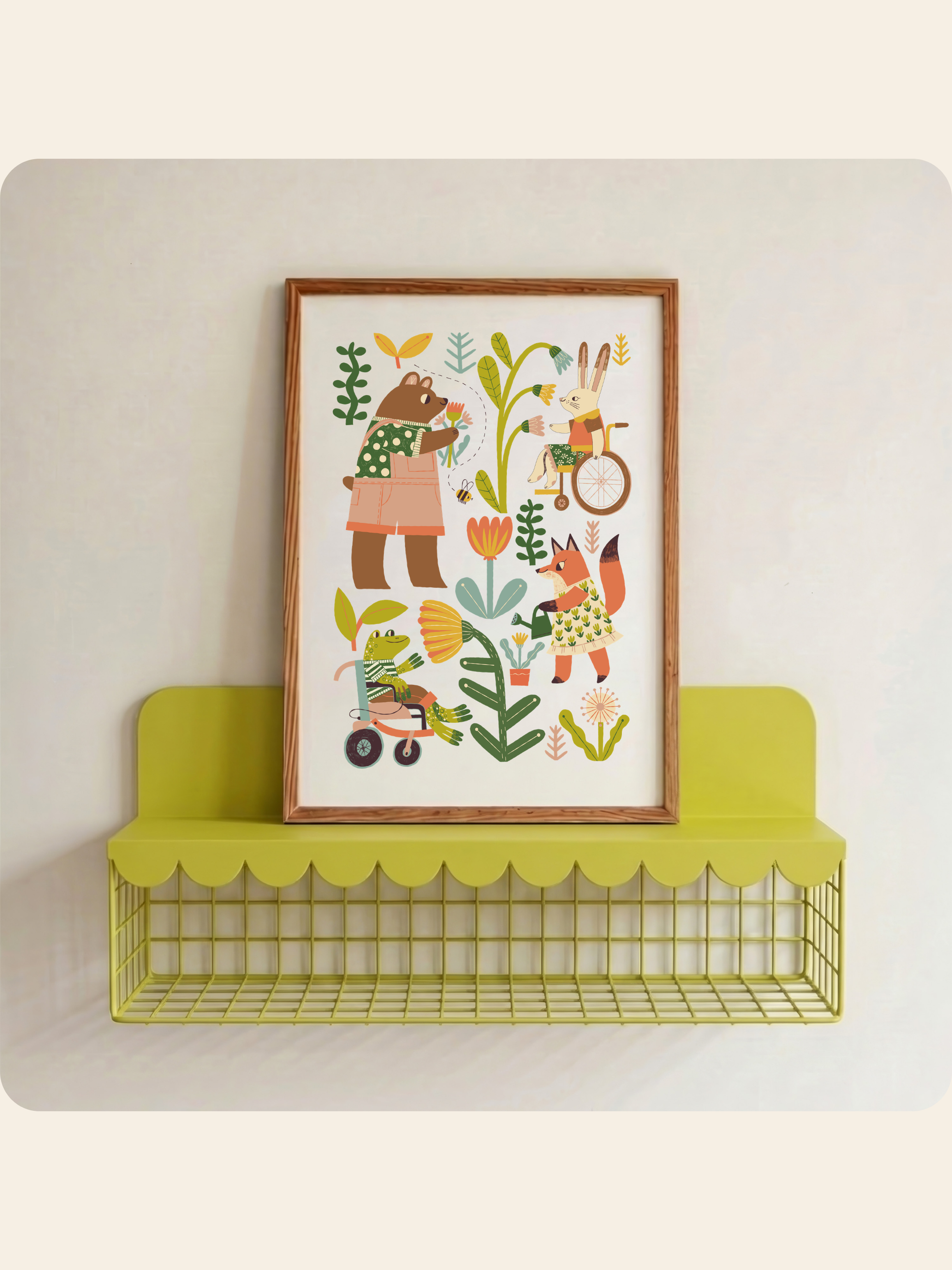 A framed whimsical art print featuring cartoon animals and plants, displayed on a lime green wire shelf against a light beige wall.
