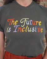 Person wearing a dark gray t-shirt with 'The Future is Inclusive' in colorful letters.